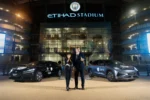 5. Stella Li & Ferran Soriano with both BYD cars (1)